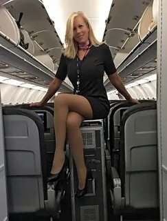 Busty flight attendants fucked big cock.