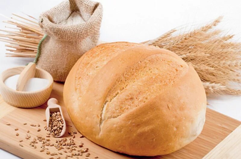 Пшеничное тесто хорошая. Хлеб. Пшеничный хлеб. Круглый хлеб. Белый хлеб.