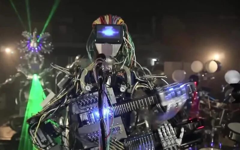 оркестр роботов. искусственный интеллект песни голосами. искусственный интеллект песни голосами. искусственный интеллект в музыкальной индустрии. написание кода искусственного интеллекта.