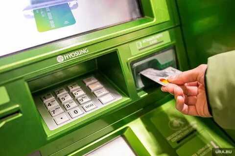 Как снять деньги с банкомата по телефону