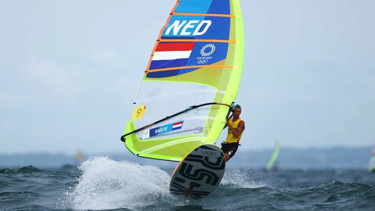 Complete the exchanges he is on windsurfing