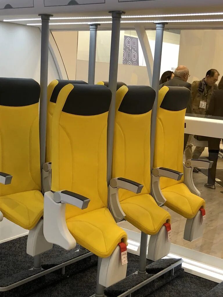 Сиденья с боку. B-8863 seat. Emergency exit in airplane. Types of seats in the airplane. Well seat.