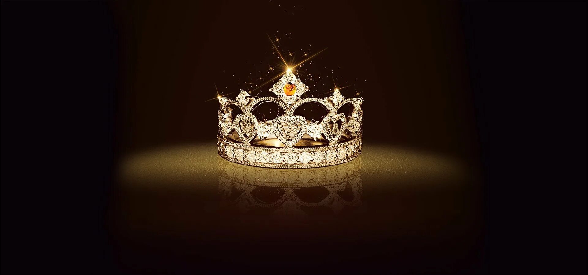 Королевское черное золото. Красивая корона. Корона на черном фоне. Корона на темном фоне. Красивый фон с короной.