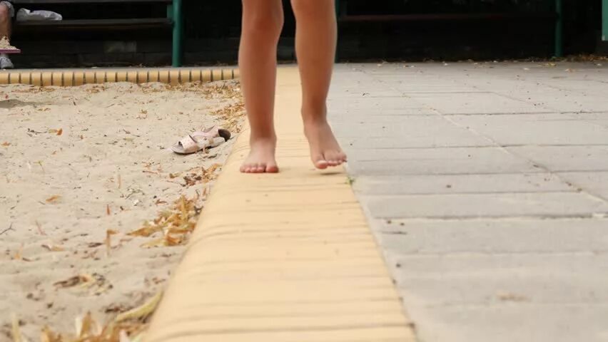 Kids Walking barefoot through Street. Barefooted meaning. Barefoot Play. Barefoot girls outside.