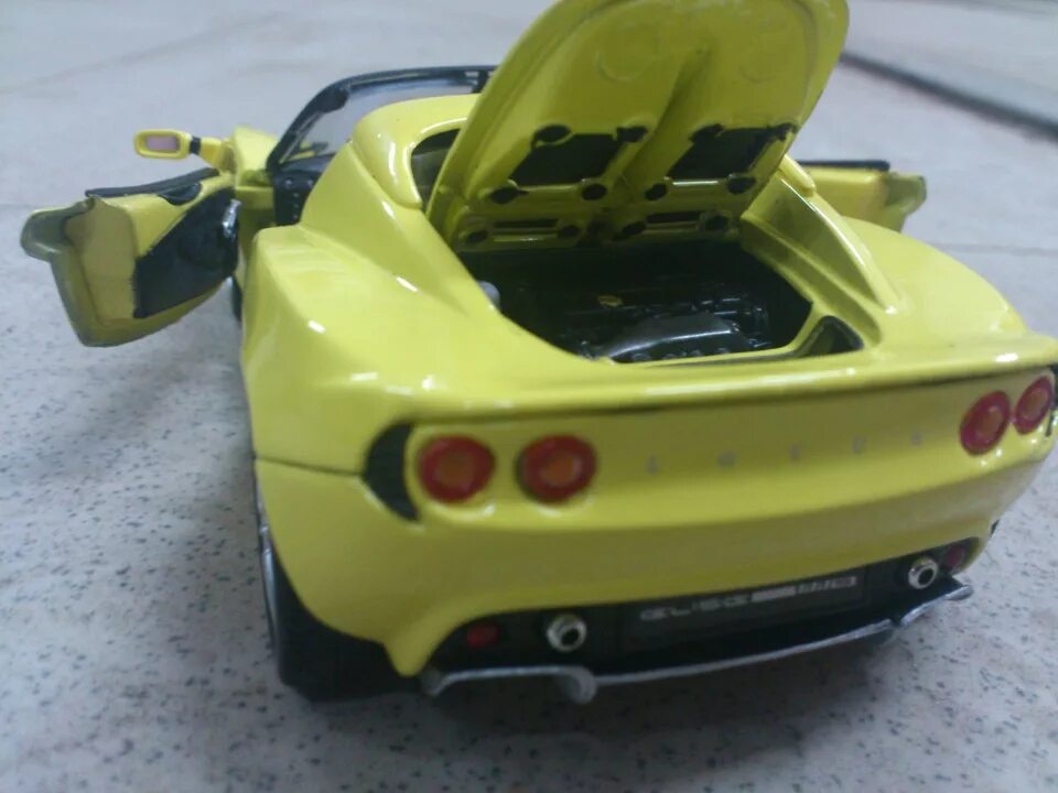 Лотус Элис 111s. Лотус Элис 2012. Lotus машинка игрушка. Надувной автодром Тачки.