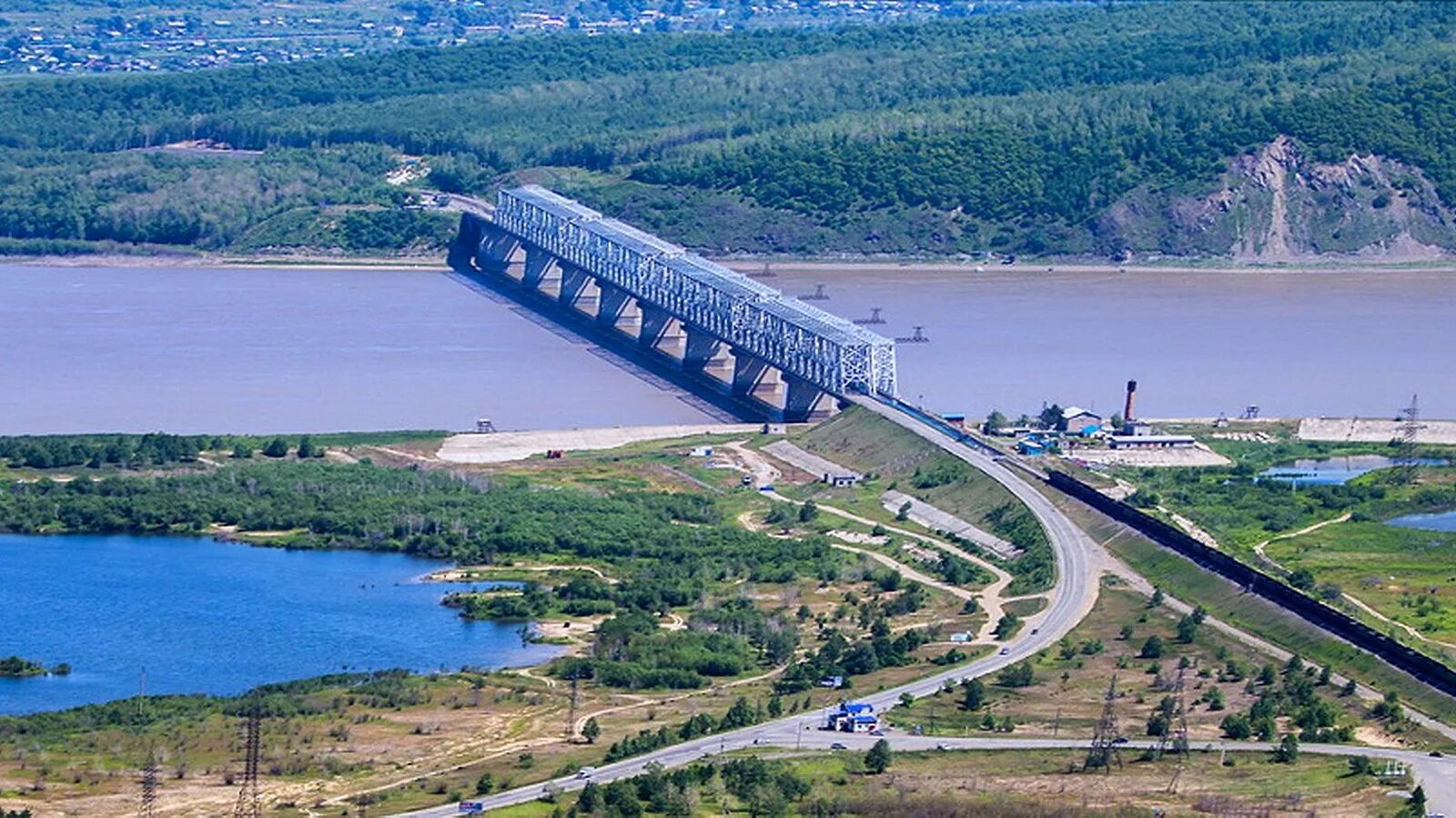 Мост через Амур Комсомольск-на-Амуре. Мост через реку Амур в Комсомольске на Амуре. Река Амур Комсомольск. Мост через Амур у Комсомольска. Комсомольск какой край