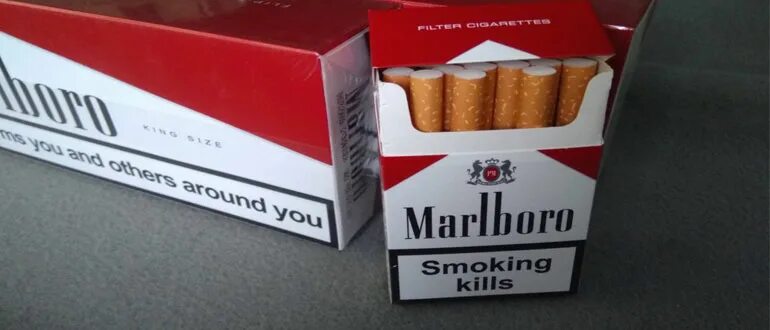 Настоящий мальборо. Marlboro красная пачка. Marlboro плакат. Сигареты marlboro в сша. Пачка сигарет мальборо.