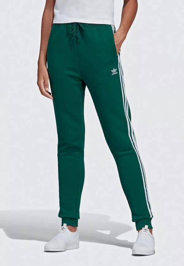 Купить зеленые штаны. Брюки adidas Originals зеленые. Брюки спортивные adidas Originals track Pants. Штаны adidas Bolt Green. Брюки спортивные adidas Regular Cuff TP.