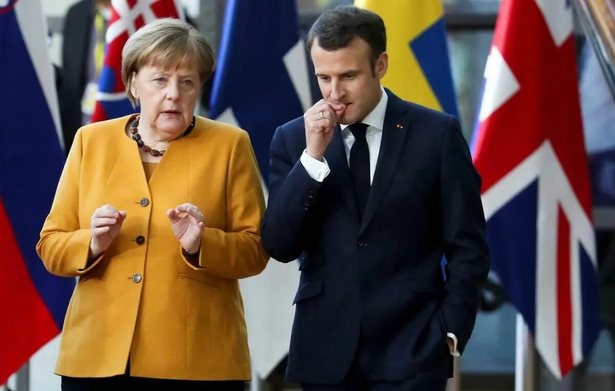 Ангела Меркель и Макрон. Макрон и канцлер Германии. Меркель и Байден. Макрон и Меркель фото. Санкции против германии