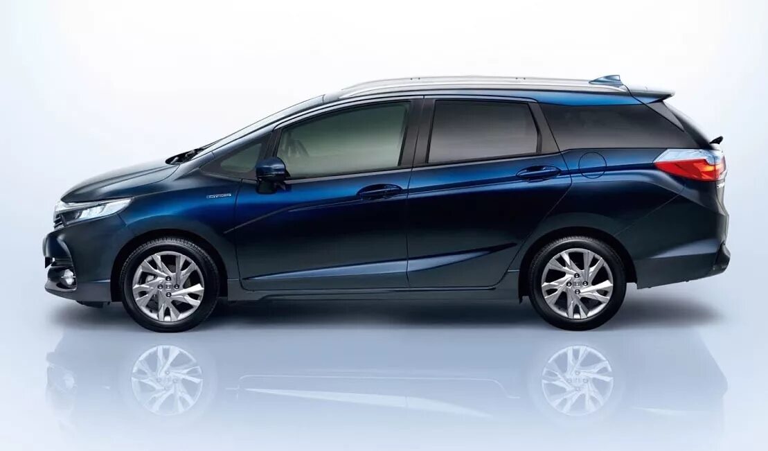 Gp7 honda. Honda Fit Shuttle Hybrid 2018. Honda Shuttle гибрид 2023. Honda Fit Shuttle 2016. Хонда фит шаттл гибрид.