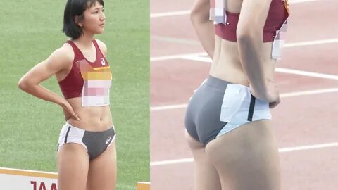 two women in sports bras standing next to each other on a track and one is ...