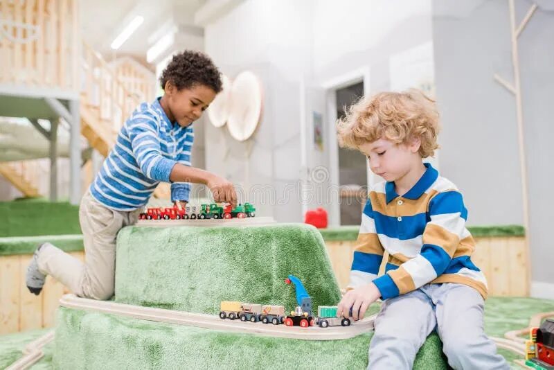 Boy little toys. Машинки для мальчиков. Современные детские игрушки. Маленький мальчик играет в игрушки. Ребенок с самолетиком.