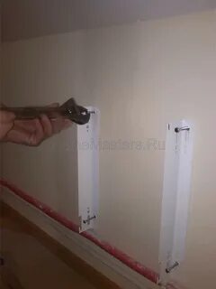 Как закрепить батарею