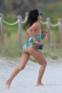 Diane Guerrero in Swimsuit at the beach in Miami. 