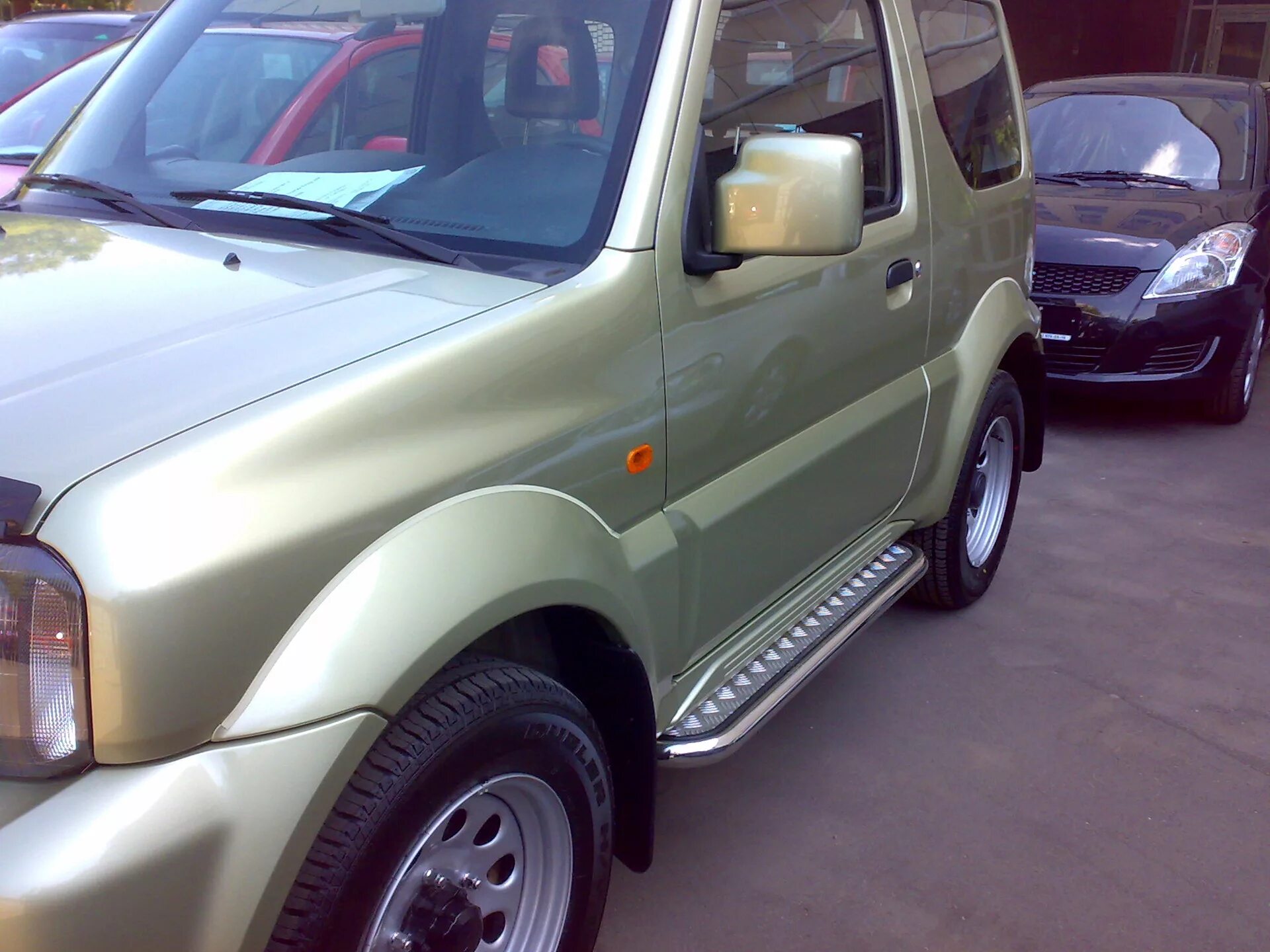 Купить порог сузуки. Пороги Suzuki Jimny 2001. Шноркель Suzuki Jimny. Пороги на Сузуки Джимни. Силовые пороги Suzuki Jimny.