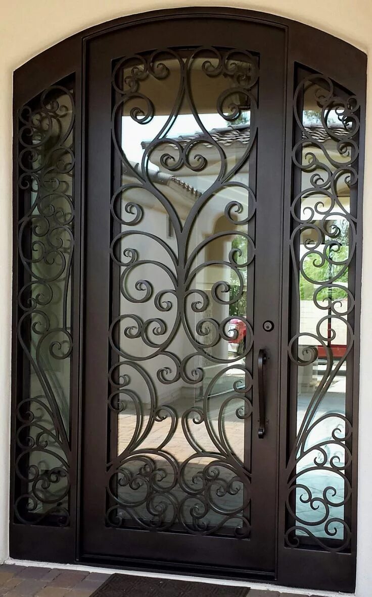 Кованые двери стеклом фото wrought iron front patio double entry wrought Arched wrought iron french double