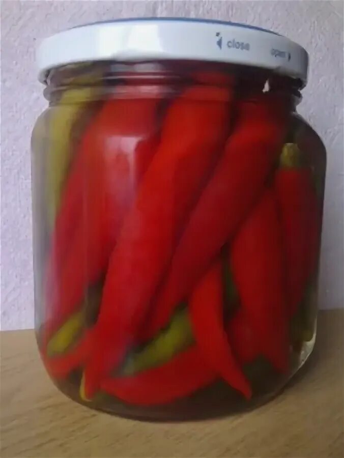 Маринованные острый красный перец. Перец стручковый горький маринованный. Перец чили маринованный. Маринованные острый красный перец. Перец чили маринованный thai hang 198г.