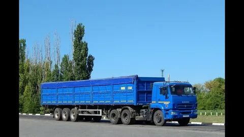 Тягач с зерновозом полуприцепом