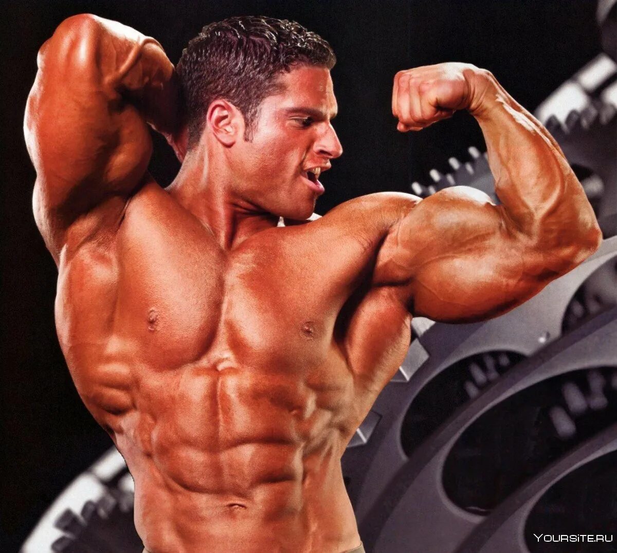 Накаченная спина. Мышцы мужчины. Накаченный бицепс. Хельмут штребль 2020. Эктоморф бодибилдер.