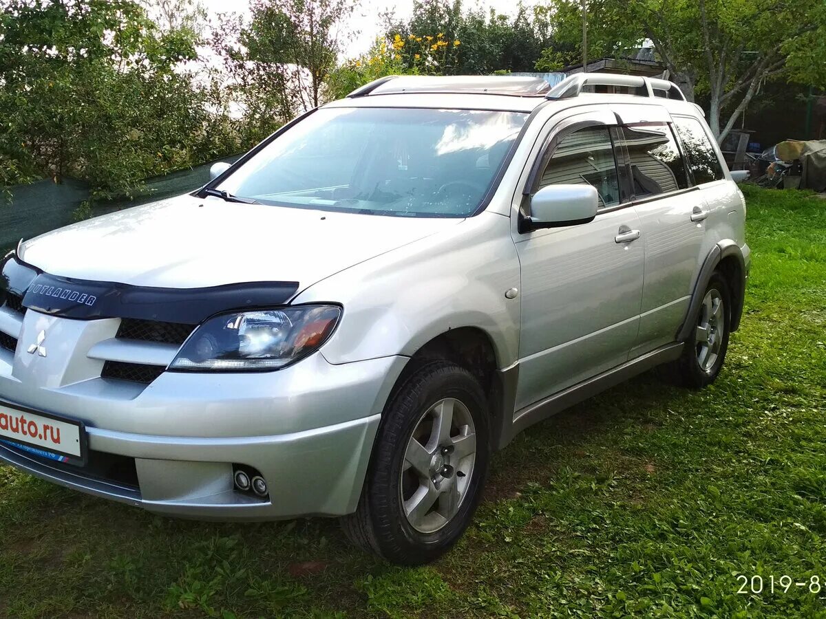 Mitsubishi outlander i 2002-2008. Митсубиши аутлендер 2002. Митсубиси аутлендер 2002 года. Mitsubishi outlander 2002. 4 4wd.