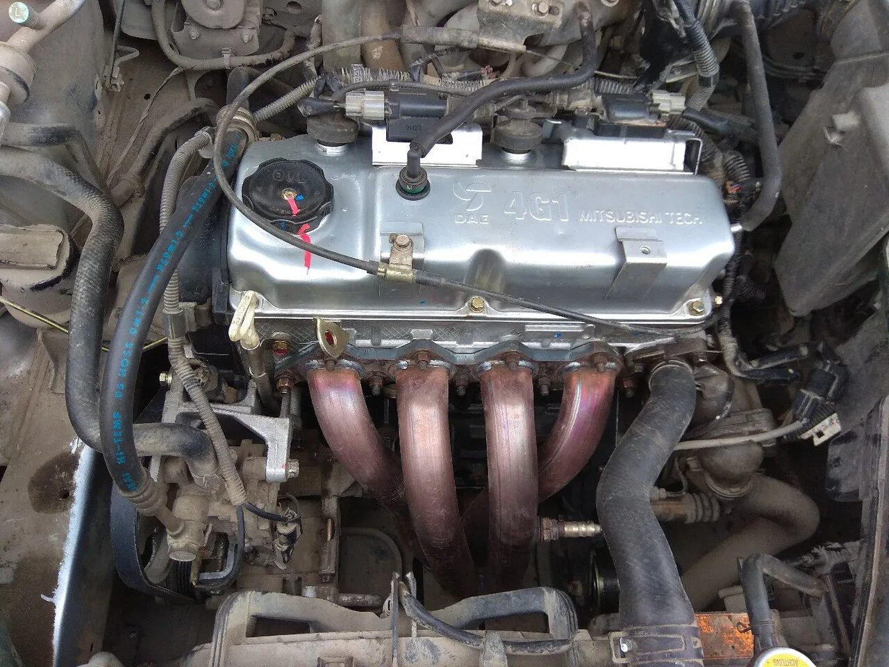 Mitsubishi 4g. Мотор 4g13 Mitsubishi. Двигатель Митсубиси 4g13. Lancer 9 4g13 двигатель. Двигатель 4g13 Mitsubishi Lancer.
