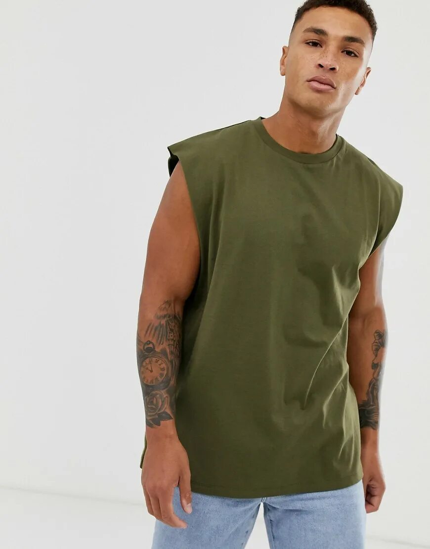 Футболка оверсайз ASOS Design. ASOS Design Oversized super Longline Sleeveless t-Shirt. Рубашка хаки Oversized мужская. Футболка оверсайз мужская хаки. Футболка укороченный рукав