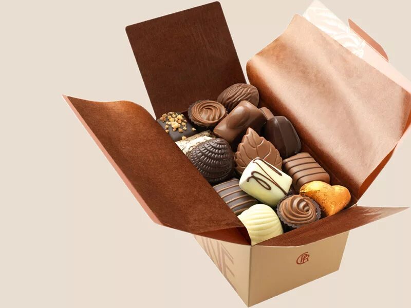 В трех коробках были конфеты. Шоколадные конфеты в упаковке. Конфеты в коробках подарочные. Коробка шоколадных конфет. Бельгийский шоколад упаковка.