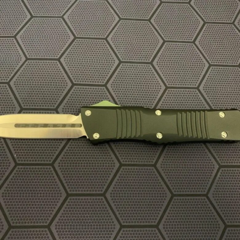 Microtech combat. Нож Microtech Combat Troodon. Нож Microtech Combat Troodon Vespa d2. Microtech Combat Troodon 00556. Microtech Combat Troodon Spear point.