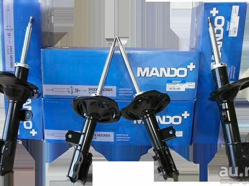 Стойки мандо отзывы. Hyundai оригинальные стойки mando. Mando Shock Absorber стойка. Creta стойки mando. Задние амортизаторы Хендай акцент Мондо.