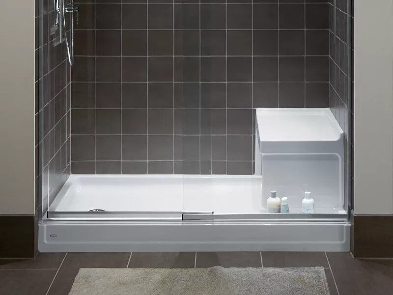 Master Shower - Concrete bench, subway tile, Delta faucets. Bathroom remodel sho