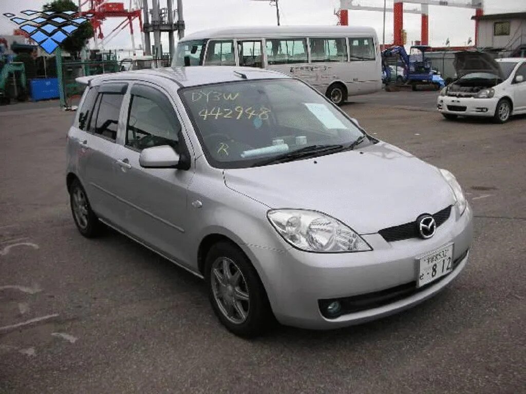 Купить мазду демио в новосибирске. Mazda Demio 2006. Mazda Demio 2006 год. Mazda Demio 2006 черный. Мазда Демио спорт 2006.