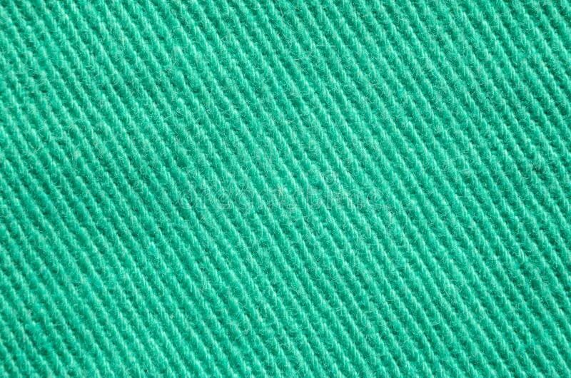 Джинса зеленая купить. Зеленый джинс ткань. Зеленая джинсовая ткань. Зеленая джинса ткань. Зеленый деним ткань.