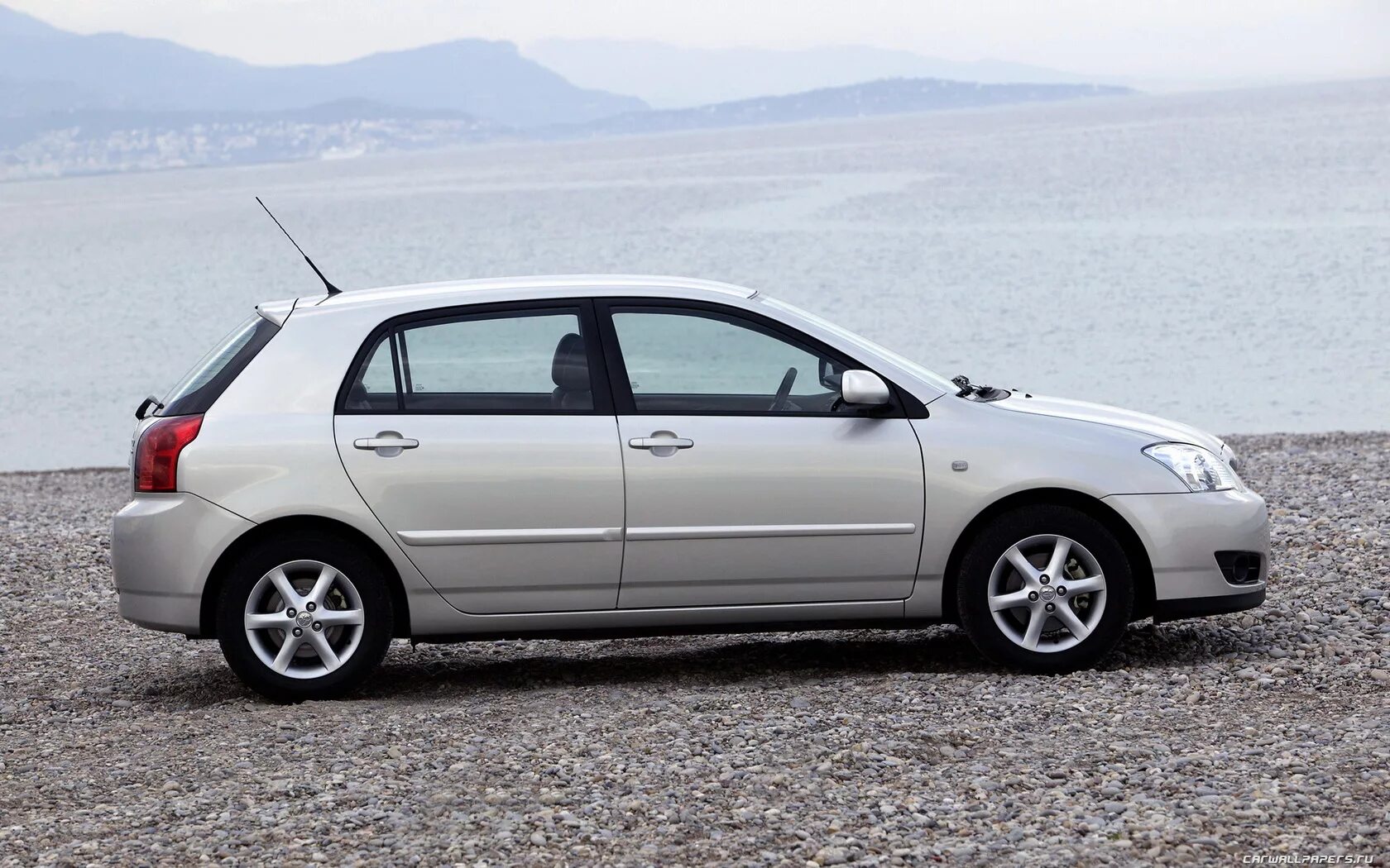 Тойота е120 хэтчбек. Тойота Королла хэтчбек 2006. 2005 Toyota Corolla Hatchback. Тойота Королла хэтчбек 2005. Toyota Corolla Hatchback 2006.