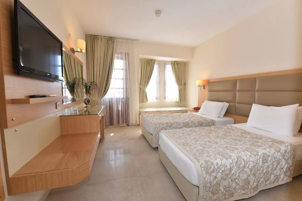 Simply fine hotel 4 турция. Турция Олюдениз отель Ализе. Alize Hotel Oludeniz 4 Турция Фетхие. Alize Hotel 4 Олюдениз. Alize Hotel Oludeniz 4 пляж.