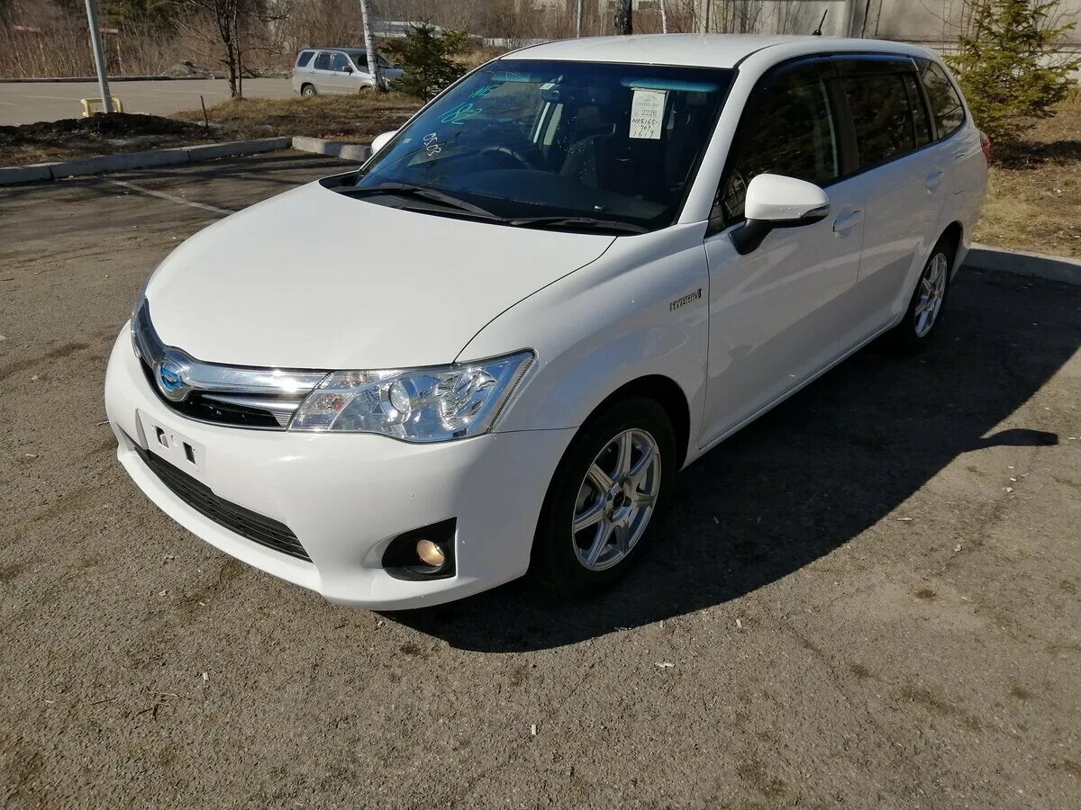 Fielder гибрид. Toyota Corolla Fielder 2015. Тойота Филдер 2015 гибрид. Тойота Королла Филдер 2015 гибрид. Toyota Corolla Fielder белый 2015.