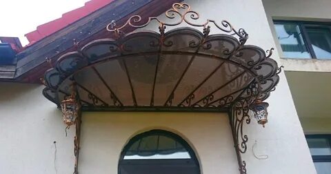 Кованые козырьки над входом