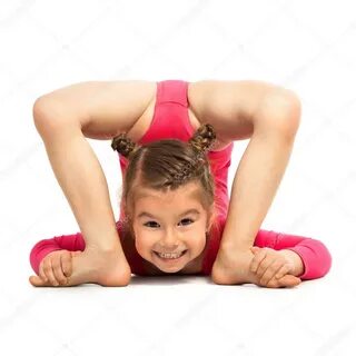 Flexible little girl gymnast doing acrobatic feat on white background Stock Phot