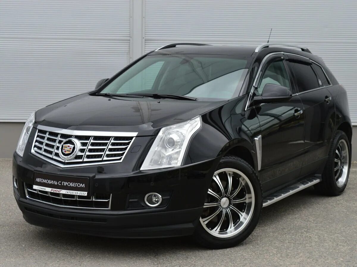 Cadillac srx 2. Кадиллак х4. Cadillac srx 2011. ) черный с пробегом на снегу. Кадиллак срх бу.