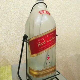 Бутылка на качелях