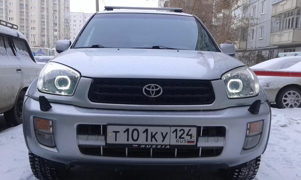 Новые черные фары с ДХО - Toyota RAV4 (III), 2 л, 2007 года тюнинг DRIVE2