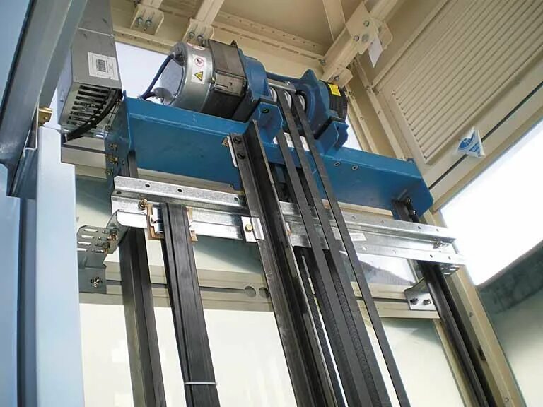 Otis gen2 лебёдка. Крепление лифтового оборудования. Передача лифтов. Механизм лифта. Монтаж лифтового оборудования.