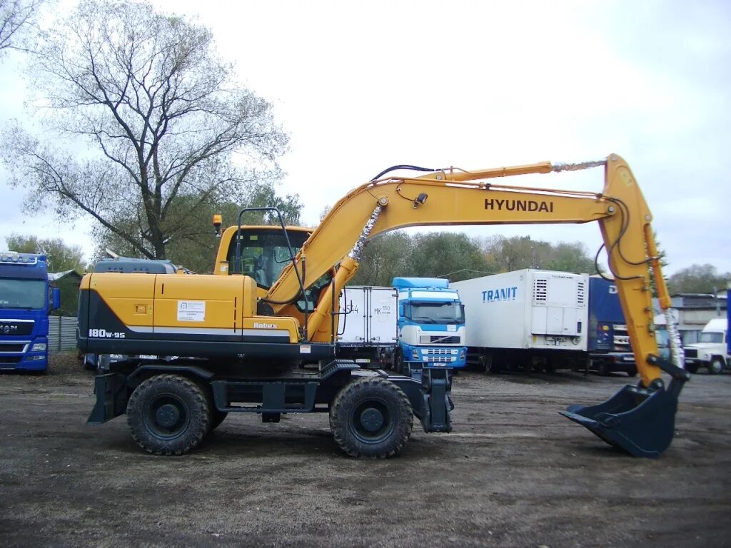 Экскаватор Hyundai r180w-9s. Колесный экскаватор Hyundai r180w-9s. Hyundai 180w-9s. Экскаватор Hyundai r180w 9.