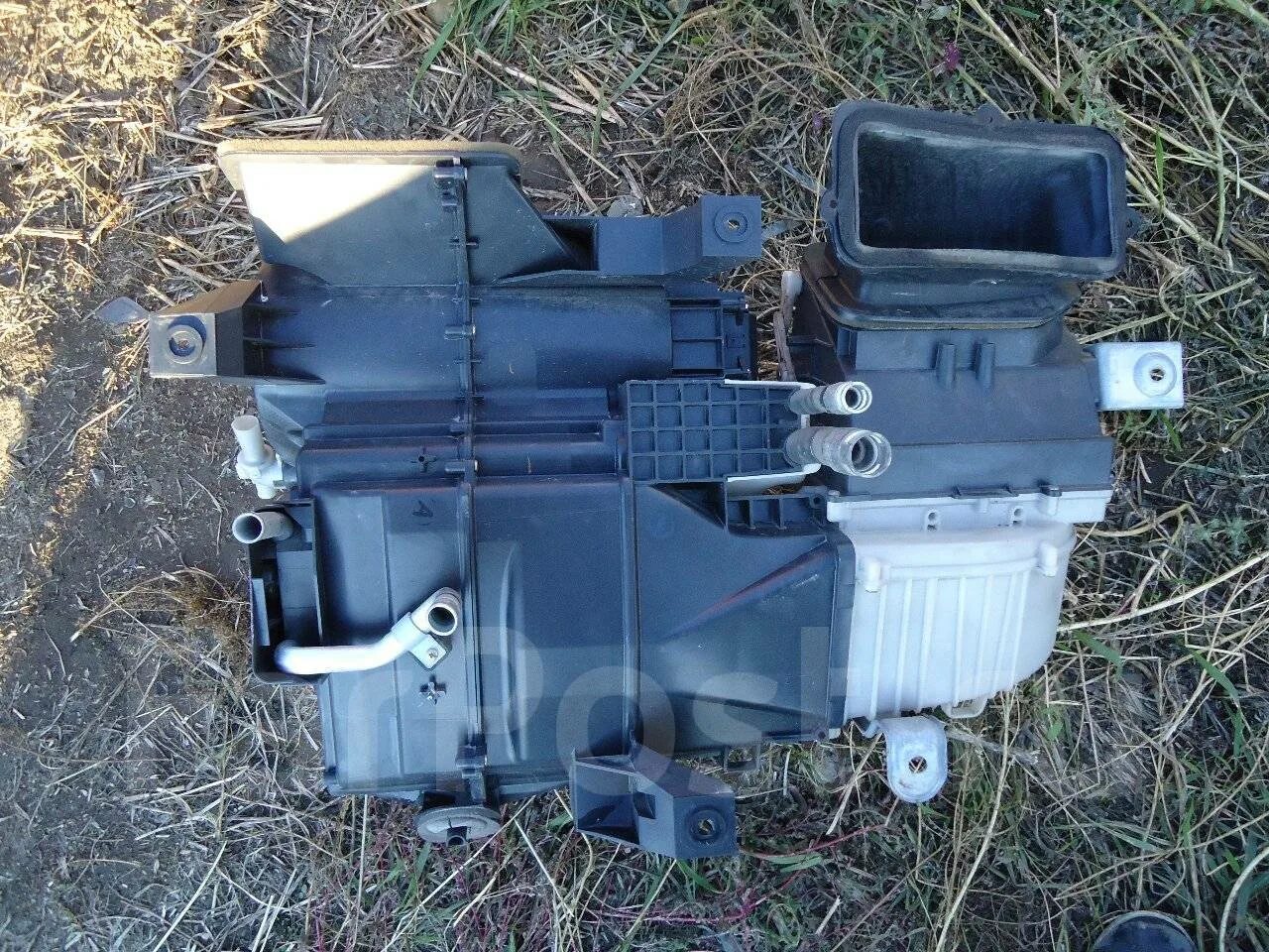 Хонда фит печка салонная. Мотор печки honda 2015. Радиатор печки хонда фит 2003. Печка хонда джаз. Отопитель хонда фит gp5.