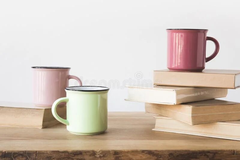 The cups are on the table. Cup on the table. tea vs coffee.
