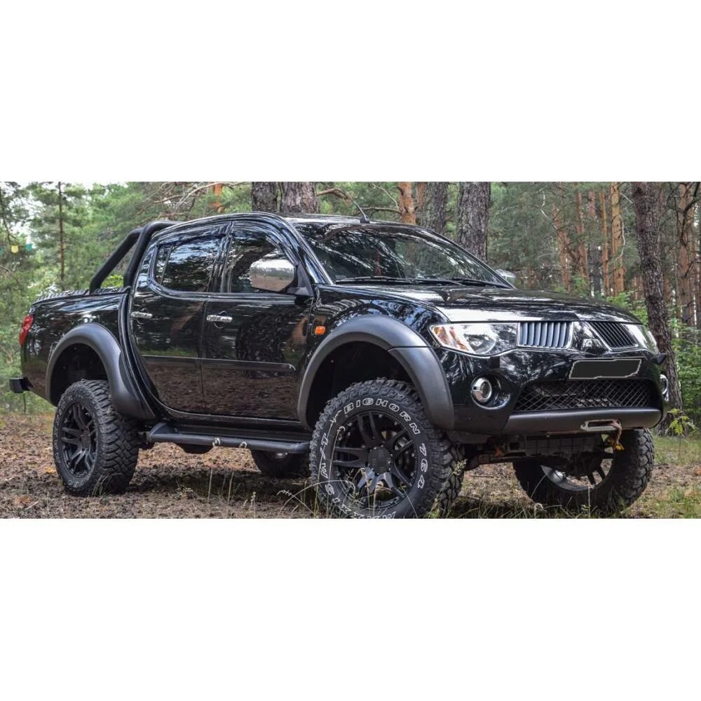 Шины l200 mitsubishi. Mitsubishi l200 Tuning. Митсубиси л200 200. L 200 Mitsubishi l200. Л200 Мицубиси оффроуд.