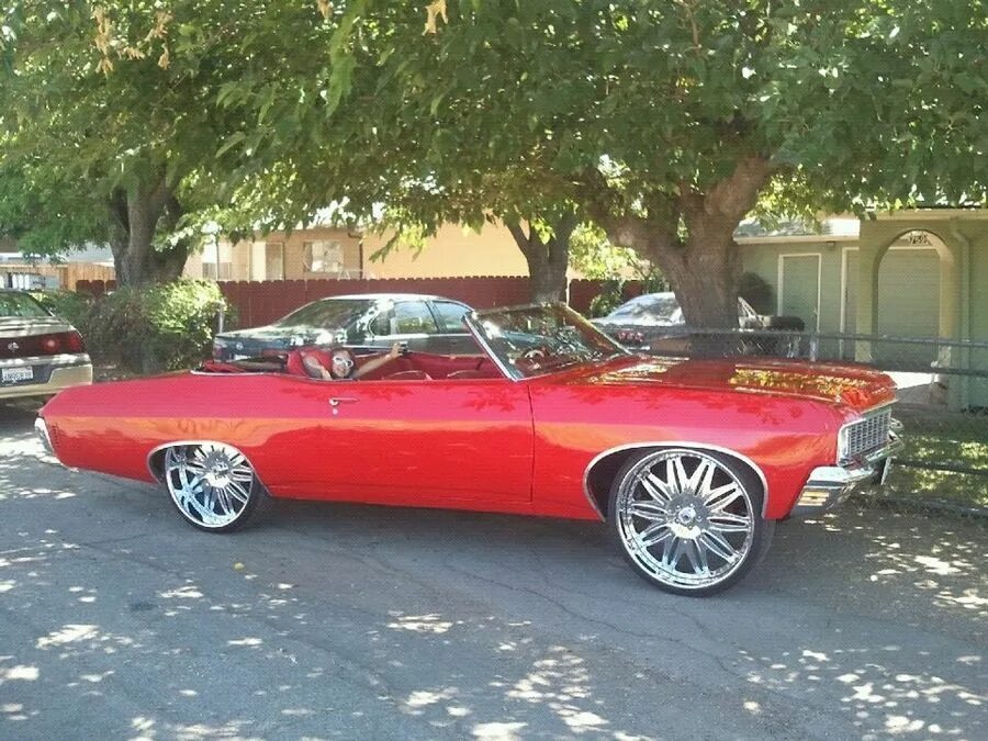 Донк это. Шевроле Импала 70. Шевроле Импала донк стиль. Impala 50. Импала 1996 широкие колеса.
