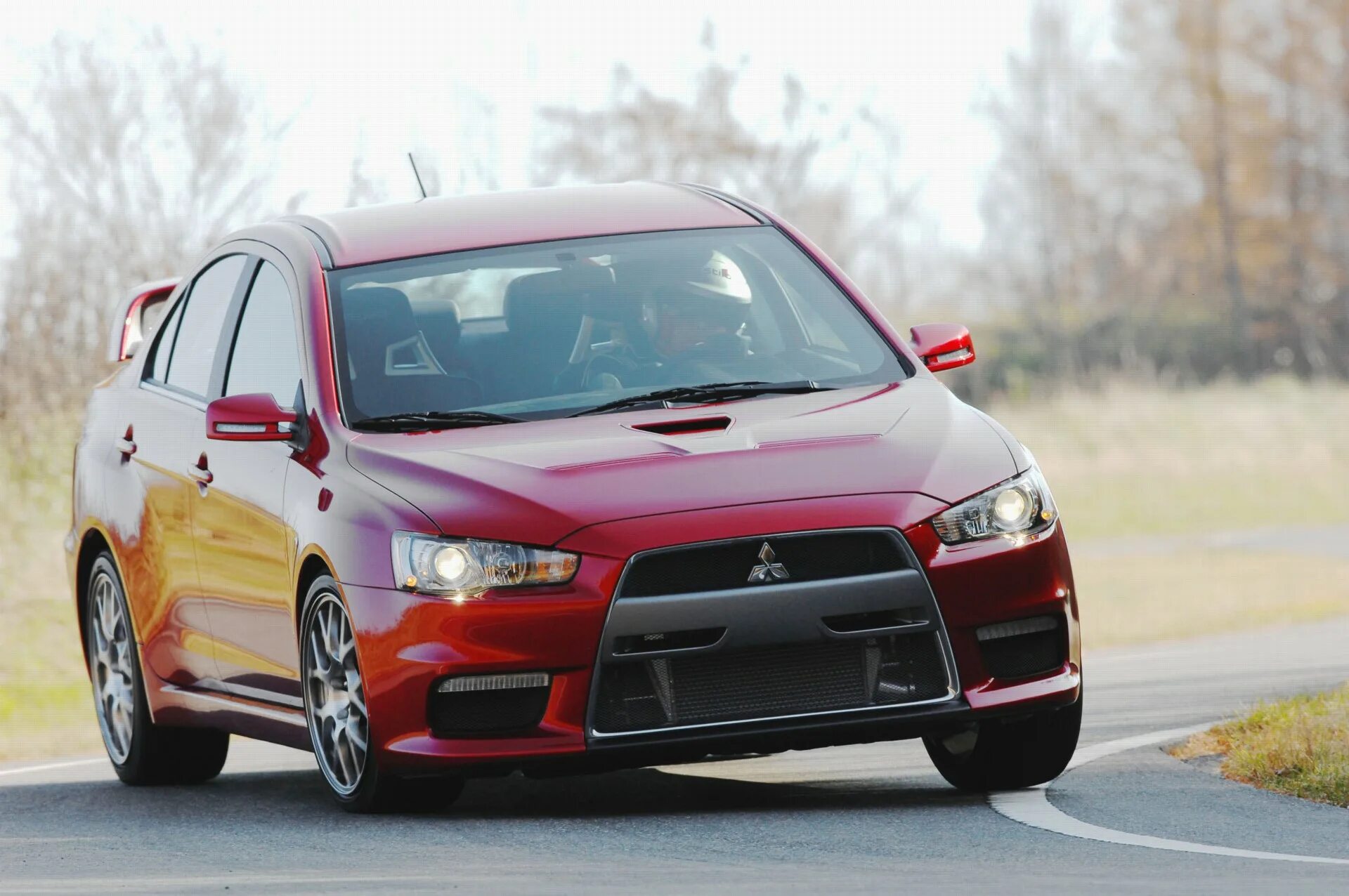 Первая мицубиси. Mitsubishi Lancer Evolution 10. Митсубиси Лансер Эволюшн 1. Mitsubishi Lancer Evolution x. Mitsubishi Lancer Evolution 10 Final Edition.