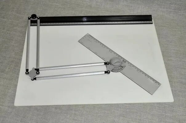 Приспособление для чертежной доски. Прибор чертежный ммк-1. Прибор для черчения. Чертежный прибор конструктор запчасти. Ученический чертежный прибор нзп ссср.