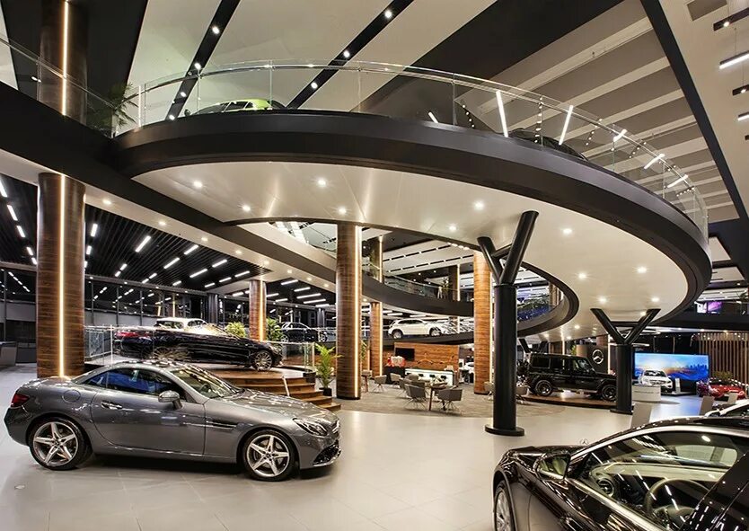 Автосалон интерьер современный. Витрины автосалонов днем. Фото автомобилей в автосалоне. Коллекция мерседесов в гараже дубай. Model in toyota showroom.