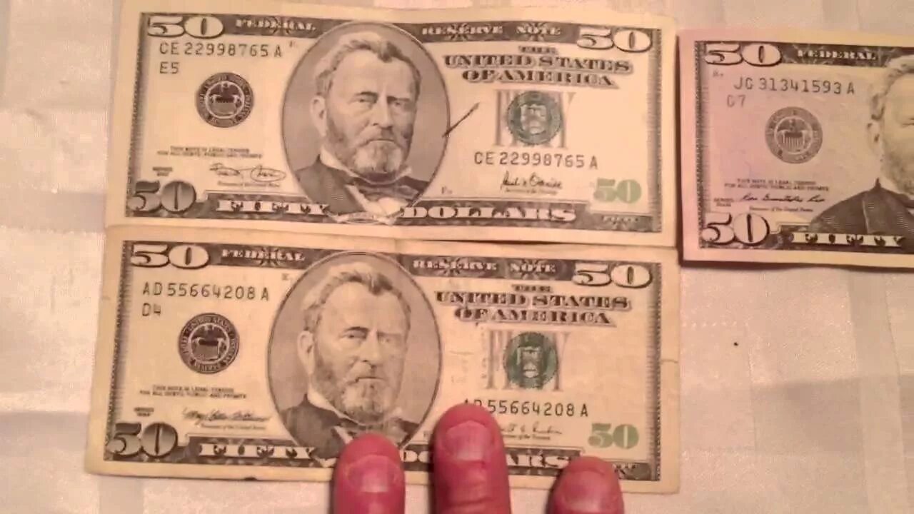 Выпуск новых долларов. Доллары старого образца. 50 Долларов. Новые и старые доллары. 50 Долларов старого образца.